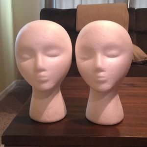 Set of styrofoam wig display heads.